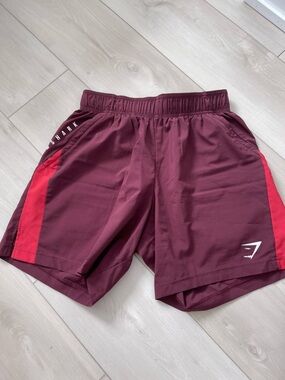 Gymshark Maroon Shorts with Red Side Stripe